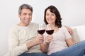 Mature couple drinking red wine Royalty Free Stock Photo