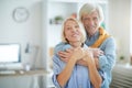 Mature Couple Embracing at Home Royalty Free Stock Photo