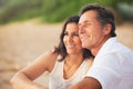 Mature Couple Enjoying Sunset on the Beach Royalty Free Stock Photo