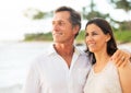 Mature Couple Enjoying Sunset on the Beach Royalty Free Stock Photo