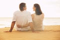 Mature Couple Enjoying Sunset on the Beach Royalty Free Stock Photo