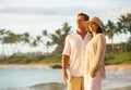 Mature Couple Enjoying Sunset on the Beach Royalty Free Stock Photo