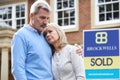 Mature Couple Forced To Sell Home Through Financial Problems Royalty Free Stock Photo