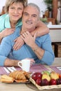 Mature couple having breakfast Royalty Free Stock Photo