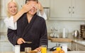 Mature couple having breakfast together Royalty Free Stock Photo