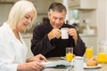 Mature couple having breakfast together Royalty Free Stock Photo