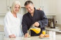 Mature couple having breakfast together Royalty Free Stock Photo