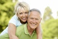 Mature couple having fun in countryside