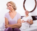 Mature couple having quarrel in bedroom Royalty Free Stock Photo