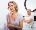 Mature couple having quarrel in bedroom Royalty Free Stock Photo