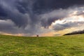 Mature couple hiking in a magnificent landscape of the Larrau under the storm