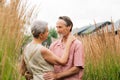 Mature couple hugging each other while standing Royalty Free Stock Photo