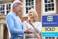 Mature Couple With Keys To New Home Royalty Free Stock Photo