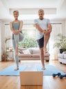 Mature couple, laptop and home yoga tutorial in house living room for body stretching, relax fitness workout and Royalty Free Stock Photo