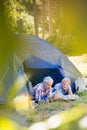 Mature couple laying and looking map Royalty Free Stock Photo