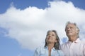 Mature Couple Looking Up Against Sky