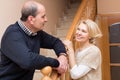 Mature couple near staircase Royalty Free Stock Photo