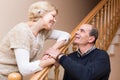 Mature couple near staircase Royalty Free Stock Photo