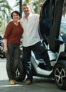 Mature couple near twizy electric
