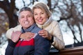 Mature couple on park bench