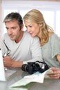 Mature couple planning to go travelling