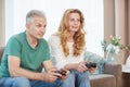 Mature Couple Playing Videogame Royalty Free Stock Photo