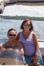 Mature couple on a pontoon boat Royalty Free Stock Photo