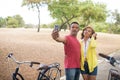 Mature couple taking selfie at bikes outdoors Royalty Free Stock Photo