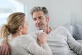 Mature couple talking and drinking coffee Royalty Free Stock Photo