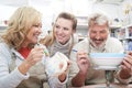 Mature Couple With Teacher In Pottery Class Royalty Free Stock Photo