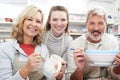 Mature Couple With Teacher In Pottery Class Royalty Free Stock Photo