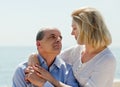 Mature couple together at sea Royalty Free Stock Photo