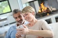 Mature couple using smartphone Royalty Free Stock Photo