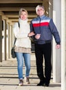 Mature couple walking outdoors