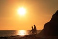 Mature couple walking in sunset Royalty Free Stock Photo