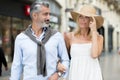 mature couple walking and talking outdoors Royalty Free Stock Photo