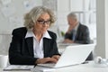 Mature couple working at office Royalty Free Stock Photo