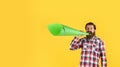 mature crazy mad man pose with megaphone. announcement concept. stop being silent. hipster screaming in the megaphone