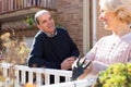 Mature cuople talking at balcon Royalty Free Stock Photo