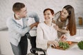 Mature disabled woman cutting vegetables in the kitchen Royalty Free Stock Photo