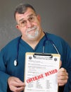 Mature Doctor Displays Coverage Denied
