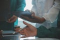 Mature doctors and young nurses stacking hands together at hospital. Close up hands of medical team stacking hands. Group of Royalty Free Stock Photo