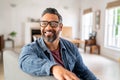 Mature ethnic man wearing eyeglasses at home Royalty Free Stock Photo