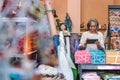 Mature woman using a digital tablet in her fabric shop Royalty Free Stock Photo