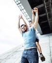 Mature father with his son under the bridge having fun together happy family, lifestyle people concept Royalty Free Stock Photo