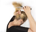 Mature female is combing her hair Royalty Free Stock Photo