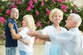 Mature friends dancing walts Royalty Free Stock Photo