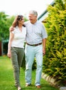 Mature, garden or happy couple hug in backyard or nature on a outdoor romantic walk for support. Wellness, smile or Royalty Free Stock Photo
