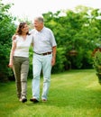 Mature, garden or happy couple hug in park or nature on a outdoor romantic walk for support. Wellness, freedom or senior Royalty Free Stock Photo