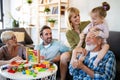 Senior grandparents playing with grandchildren and having fun with family Royalty Free Stock Photo